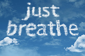 clouds spelling, "just breathe"