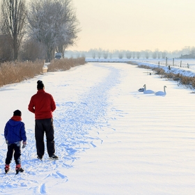 Writing a 5 W’s Story Two ice skaters glide along a frozen river