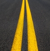 parallel yellow stripes on road